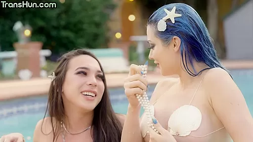 Small boobs TS mermaid fucks babe outdoor on swimming pool