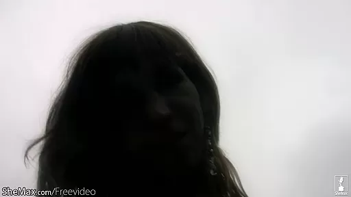 Brunette tranny in sexy bikini rubbing her big cock outdoors