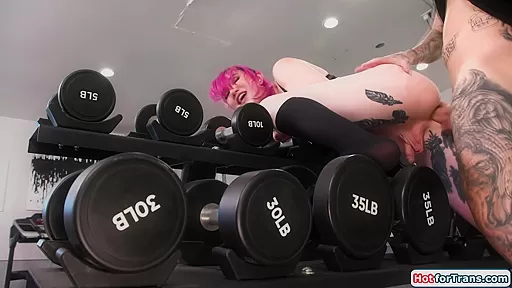 Stuck tattooed shemale Lena Moon ass rimmed and sucking cock