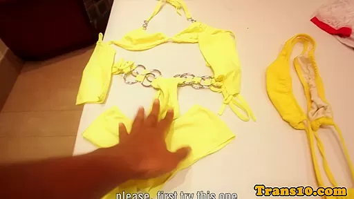 Spex trans in a bikini plays with her bigtits