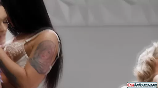 Three shemales and a big tits babe in group blowjob and anal