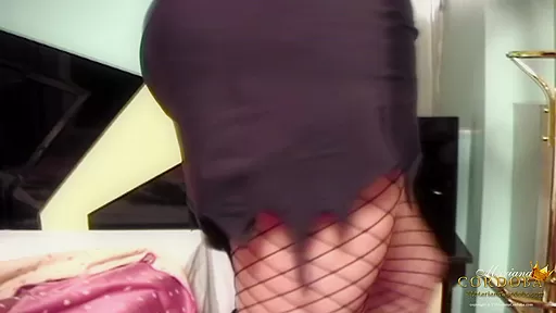 Fishnet stockings and a huge cock
