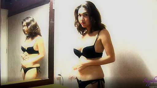 Hung Sapphire Young in the mirror