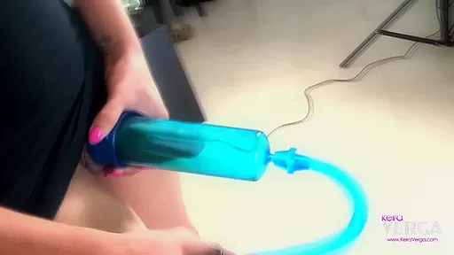 Playing with her cock pump