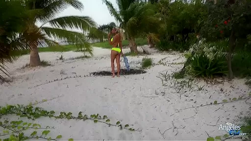 Sexy blonde babe taking off her bikini at the beach