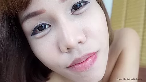 Ladyboy Noey is all smiles as she tops a guy while stroking his cock to a creamy finish