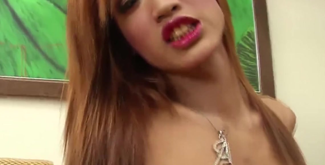 Redhead Ladyboy with High Heel Boots Strokes her Fat D