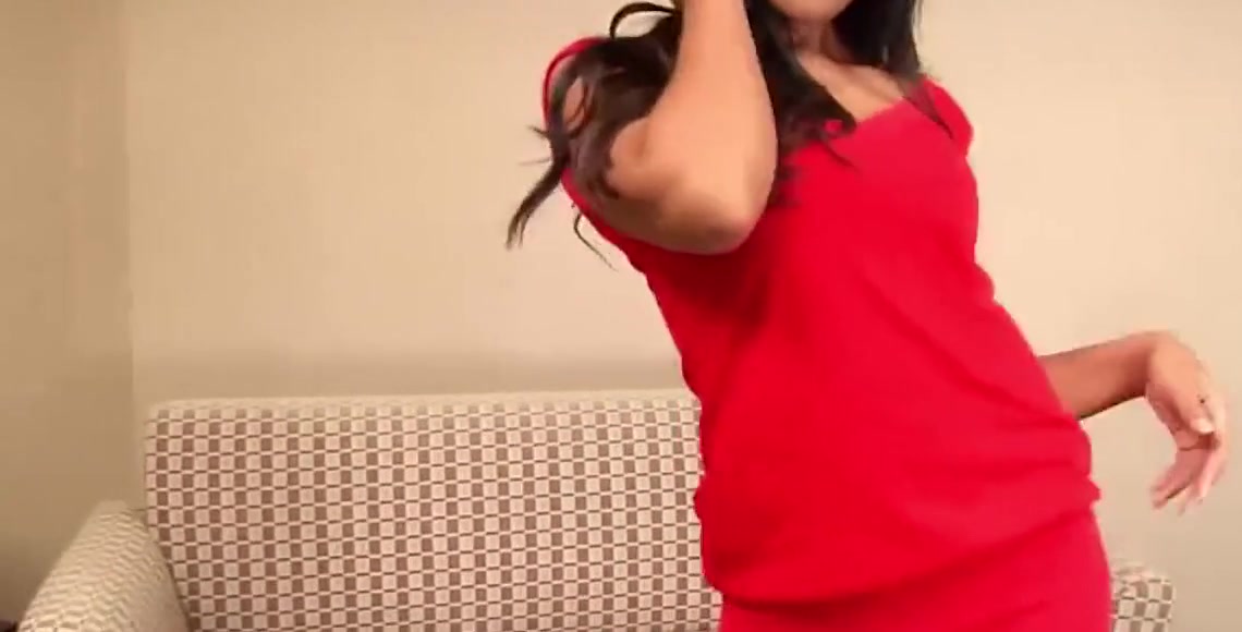 Dark-haired Ladyboy in Red Dress Plays with h