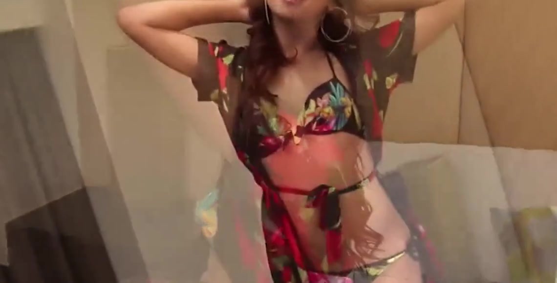 Brunette Ladyboy in Colorful Bathrobe Spreads her Trimme