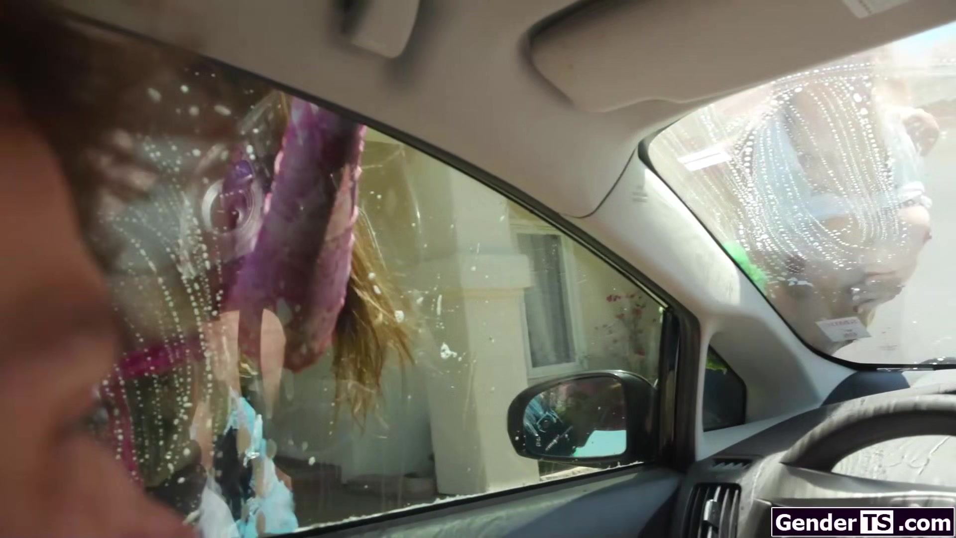 These two super sexy tgirls want to wash more than just cars